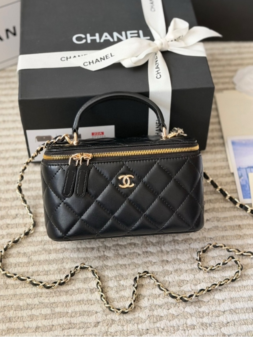 CHANEL Black Quilted Leather Vanity Bag with Gold Chain